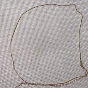 Thin gold waist chain that didn't fit me but could prob fit you
